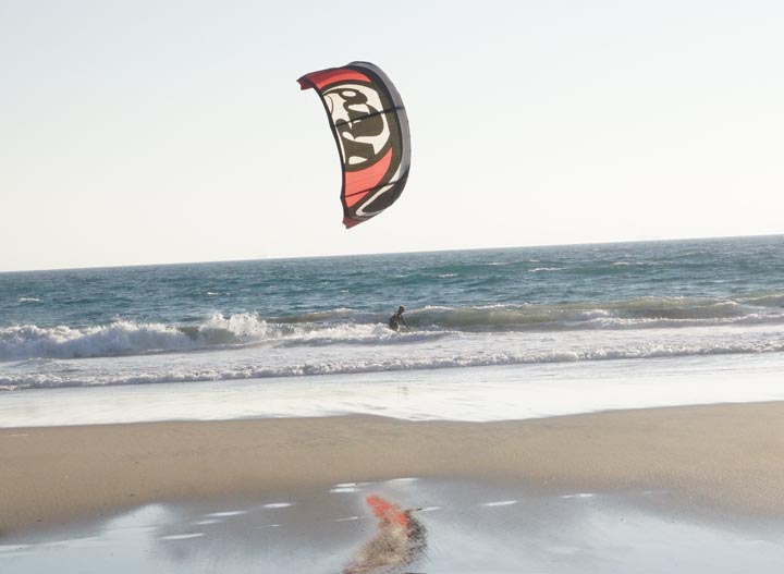 kite-surfing-mirror-image-huntington-beach