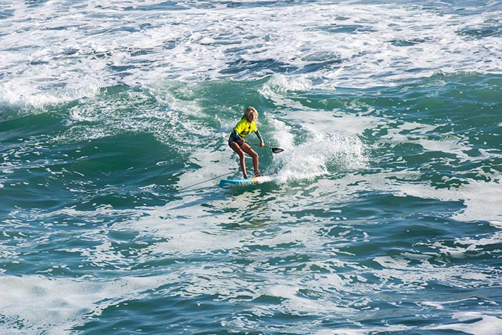 girl-paddleboarder-south-pier-june-hb-competition